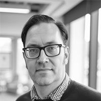 Black and white headshot of Michael Hutchins