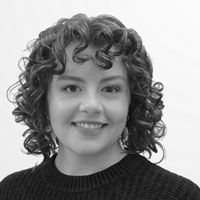 Black and white headshot of Sarah Srokosz. 