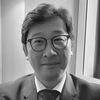 Headshot of Hyung Heon Kim in greyscale