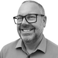 Greyscale Headshot of Garry Wright