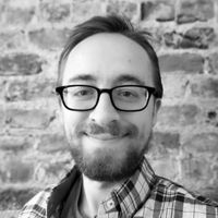 Greyscale Headshot of Nathan Frey, PhD