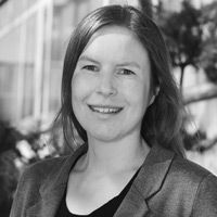 A greyscale headshot of Hanna Tuomisto