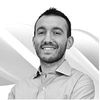 A greyscale headshot of Riccardo Dainese