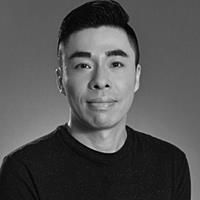 A greyscale headshot of Liang Oscar Qiang