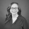 Black and white headshot of Susan Harrison Uy.