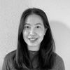 A greyscale headshot of Christina Chang.