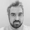 Headshot of Craig Bradley in greyscale.