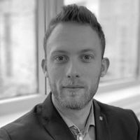 Headshot of Matej Metkovic in greyscale.