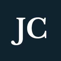 Capital J and C on a navy background.
