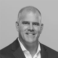 Headshot of Dr. Mark Van Oene in greyscale.