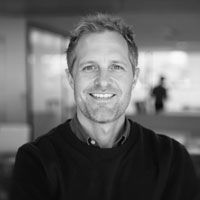 Headshot of Chris Brooks in greyscale.