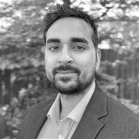 Headshot of Dr. Hamzah Syed in greyscale.