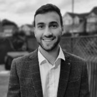 A greyscale headshot of Thomas Smith