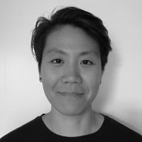 A greyscale headshot of Hazel X. Ang