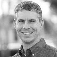 Greyscale image of Dr. Robert Balog.
