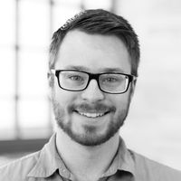 Greyscale image of Ben Greulich, PhD