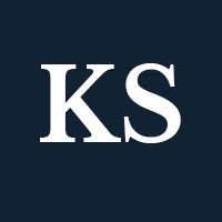 Initials K S on a dark background.