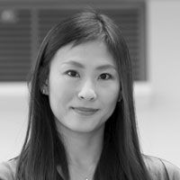 A grayscale image of Dr. Vivian Li, smiling slightly at the camera.