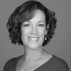 A greyscale headshot of Jodi L. Kroeger