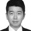 A greyscale headshot of Amos Chungwon Lee