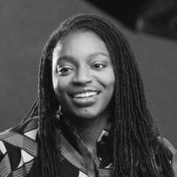Headshot of Dr. Erika Moore in greyscale.