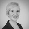 A grayscale image of Dr. Maren Feist, smiling at the camera.