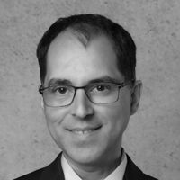 Headshot of Dr. Stefan Ullrich in greyscale.