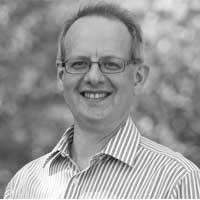 Black and white headshot of Professor Johnathan Hirst.