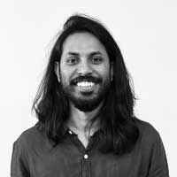 Black and white headshot of Udayan Umapathi.