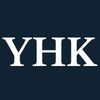 White initials YHK on a dark background.