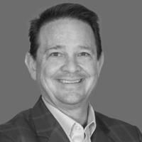 Greyscale headshot of Mark Bertagnolli