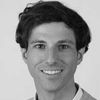 Black and white headshot of Dr. Gerald Posch.