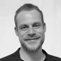 Greyscale Headshot of Christian Reuter, PhD