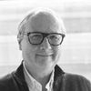 A grayscale image of Prof. Bart Vanhaesebroeck, smiling slightly.