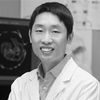 Headshot of Prof. Mo Li in grayscale.