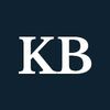 White capital K and B letters on a navy background.