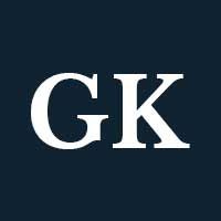 White capital G and K letters on a navy background.