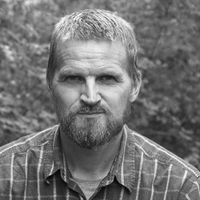 A greyscale headshot of Markus Sillanpää