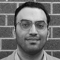 Headshot of Dr. Amin Valiei in grayscale.