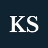 The initials K and S against a black background.