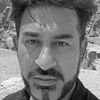 A greyscale headshot of Sufyan Pandor