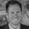 A greyscale headshot of Jens Trafkowski