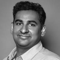 A greyscale headshot of Upendra R Anumala