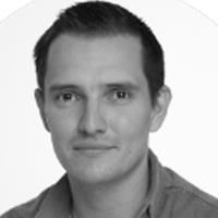 A greyscale headshot of Sören Planckaert