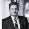 Black and white headshot of Colin Andrew Cook.