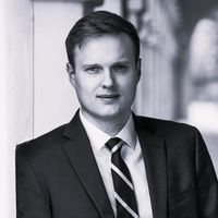 Black and white headshot of Colin Andrew Cook.