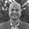 Black and white headshot of Dr. Senthil Ramaswamy.
