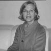 A black and white image of Mangelschots, smiling at the camera.